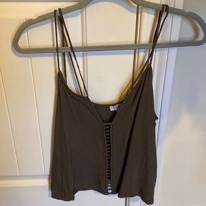 Double strapped cropped tank top with cutouts down the middle
